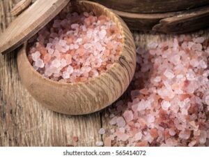 pink salt himalayas on wooden 260nw 565414072